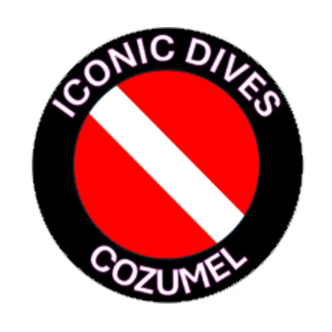 Red and white diagonal stripe circular patch with black border, featuring the text ’iconic dives’ at top and ’cozumel’ at bottom.